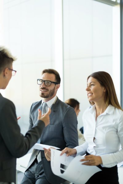 Picture of business colleagues talking in office Picture of business colleagues talking in office