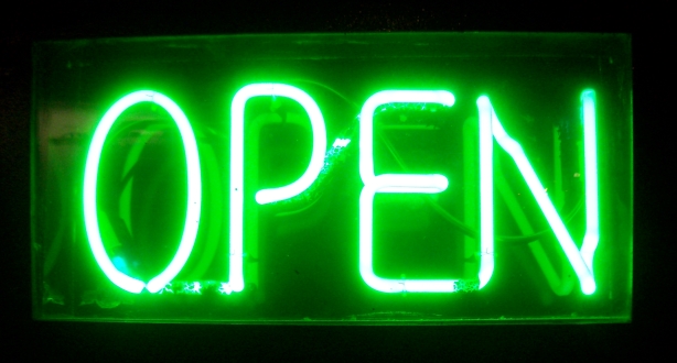 green led poster that says "OPEN"